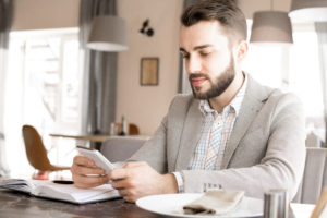 Concentrated Thoughtful Handsome Young Businessman Checking Mess Divorce consultation with Turner Stack & Caplin St. George Attorneys Utah